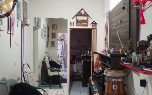 Casa com dois quartos sala cozinha área de serviço e garagem ampla bairro Silva