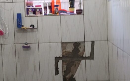 Casa com dois quartos sala cozinha área de serviço e garagem ampla bairro Silva